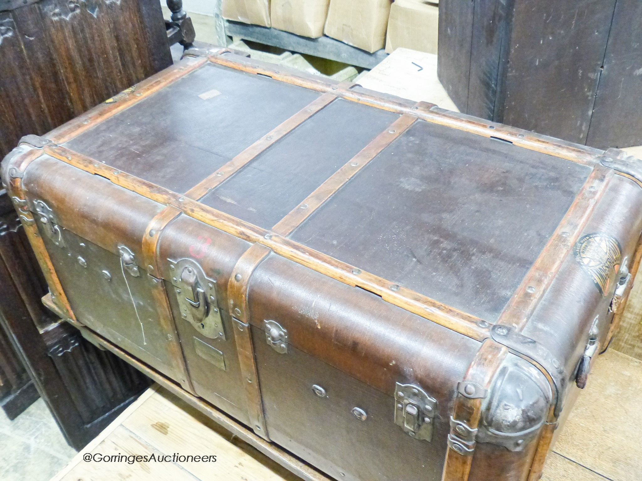 A vintage wood bound travelling trunk, length 102cm, depth 60cm, height 43cm